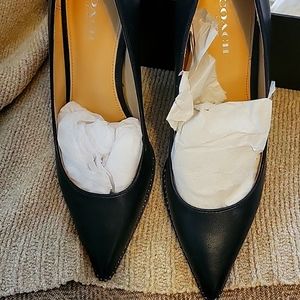 Coach Pumps